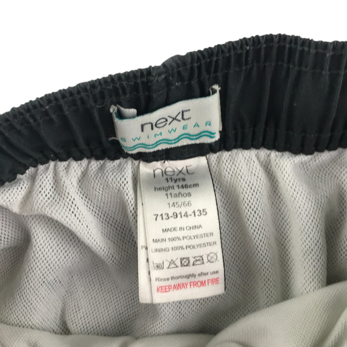Next 10-11 years black swim trunks