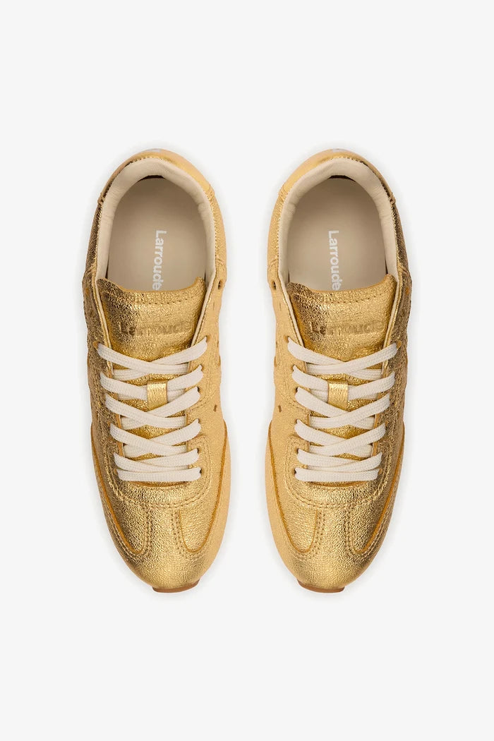 Stella Sneaker In Gold Metallic Leather Sneaker Larroudé
