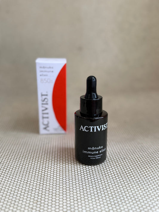 Activist manuka immune elixir. dark glass dropper bottle.