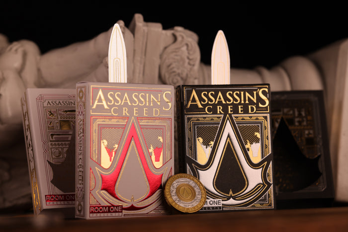 Assassin's Creed playing card bundle  with decorative elements on a dark background