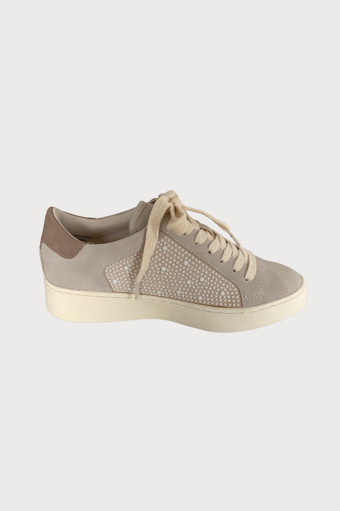 The Berne Pearlescent Paneled Sneakers are unique, but still have timeless elements. With neutral colors and a soft touch suede-like feel, this sneaker looks elevated without the fuss. Plus, the pearl details make this sneaker standout.