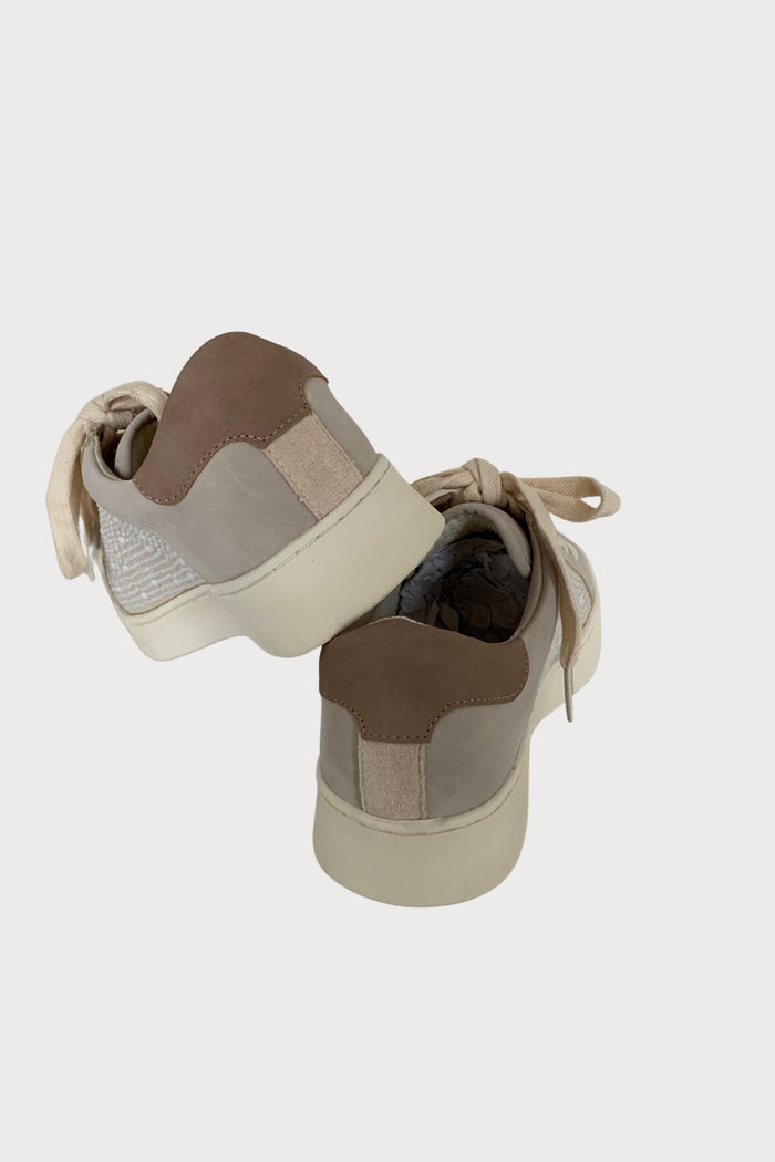 The Berne Pearlescent Paneled Sneakers are unique, but still have timeless elements. With neutral colors and a soft touch suede-like feel, this sneaker looks elevated without the fuss. Plus, the pearl details make this sneaker standout.