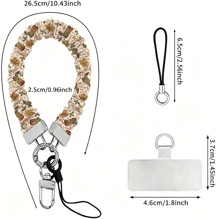 Boot Scootin' Christmas scrunchie wrist strap dimensions: 26.5 cm strap, 2.5 cm wide, 6.5 cm loop, 4.6 x 3.7 cm phone tab
