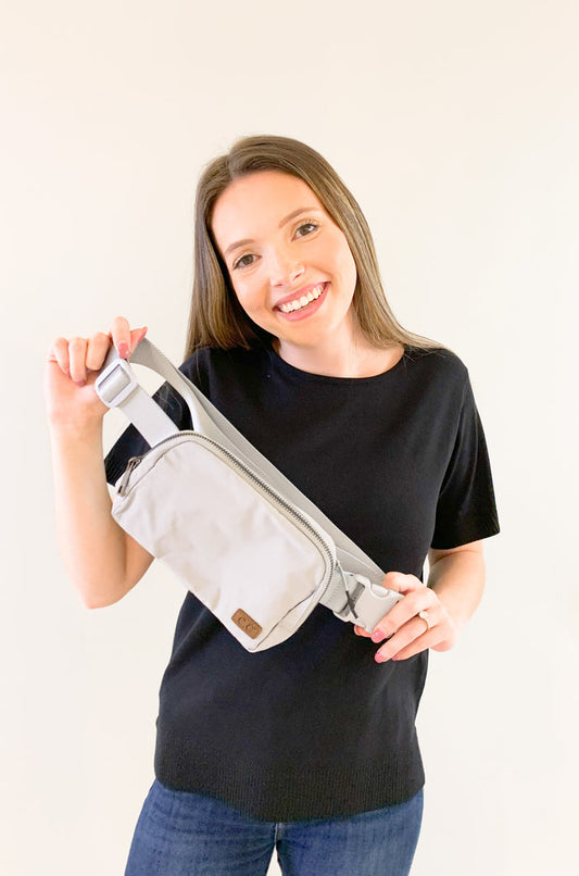 The C.C  Waterproof Mini Belt Bags are made for women on the go! You can wear them as a traditional "fanny pack" belt bag, or try the sling bag trend. Either way, this mini accessory is hands free and effortless. It has multiple inner storage compartments with an extra exterior zipper pocket on the bag. On the front, there is a small brown faux leather cc logo.