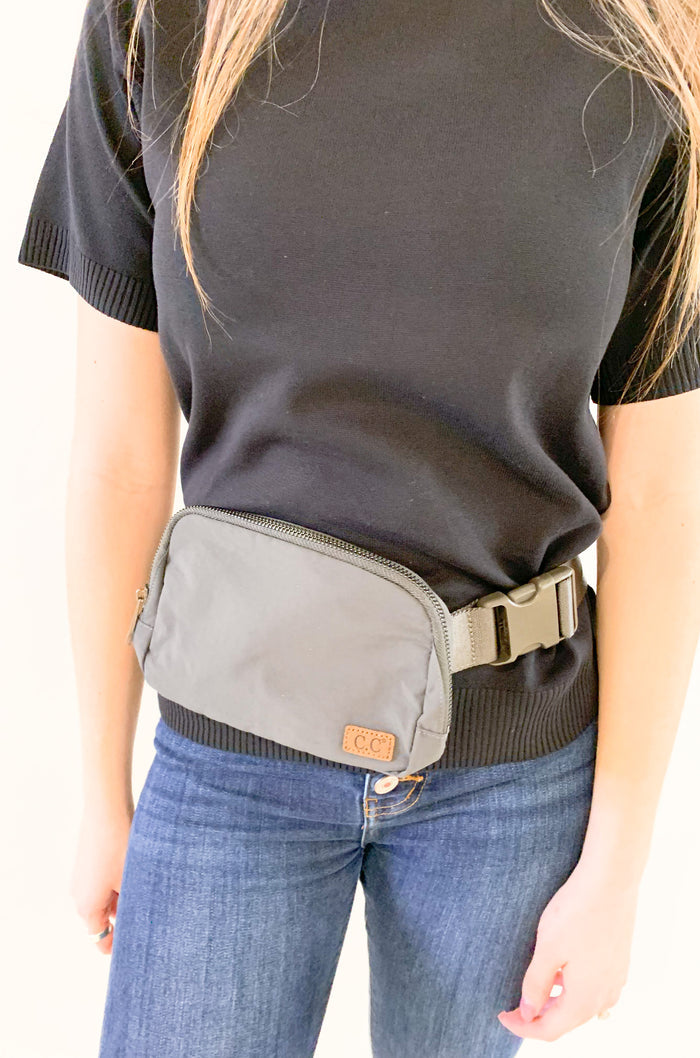 The C.C  Waterproof Mini Belt Bags are made for women on the go! You can wear them as a traditional "fanny pack" belt bag, or try the sling bag trend. Either way, this mini accessory is hands free and effortless. It has multiple inner storage compartments with an extra exterior zipper pocket on the bag. On the front, there is a small brown faux leather cc logo.