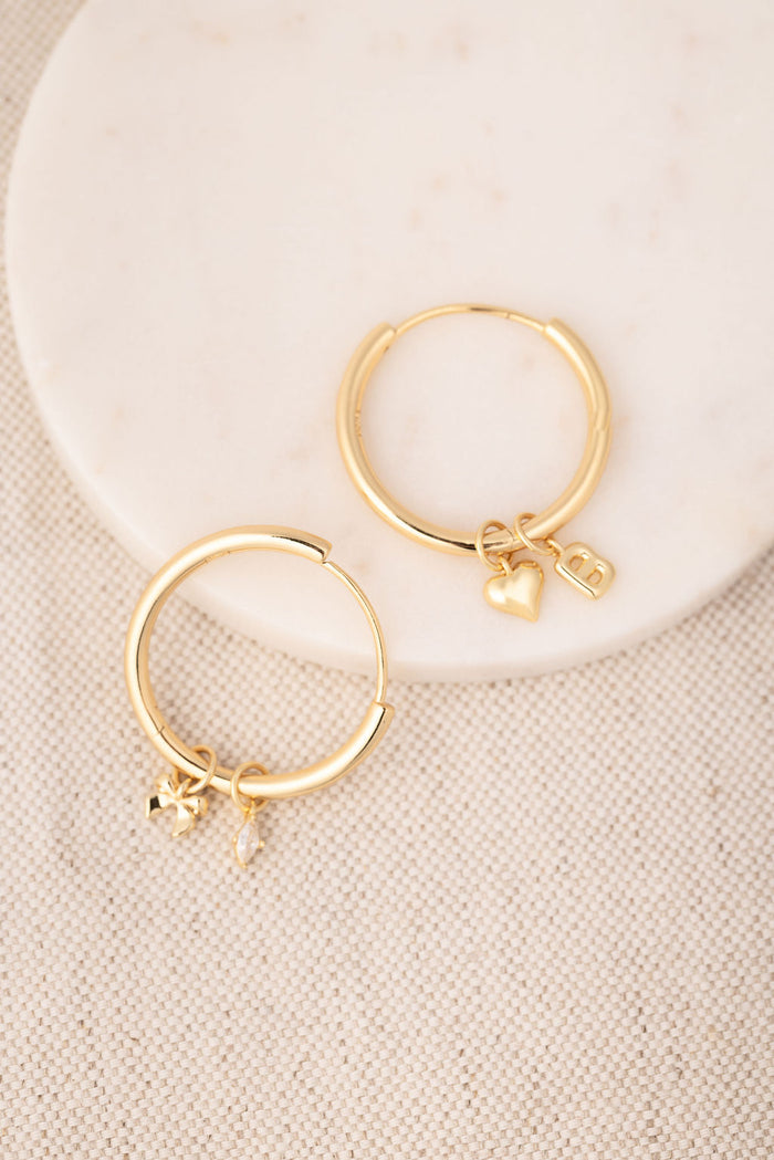 Claire Symbol Charm