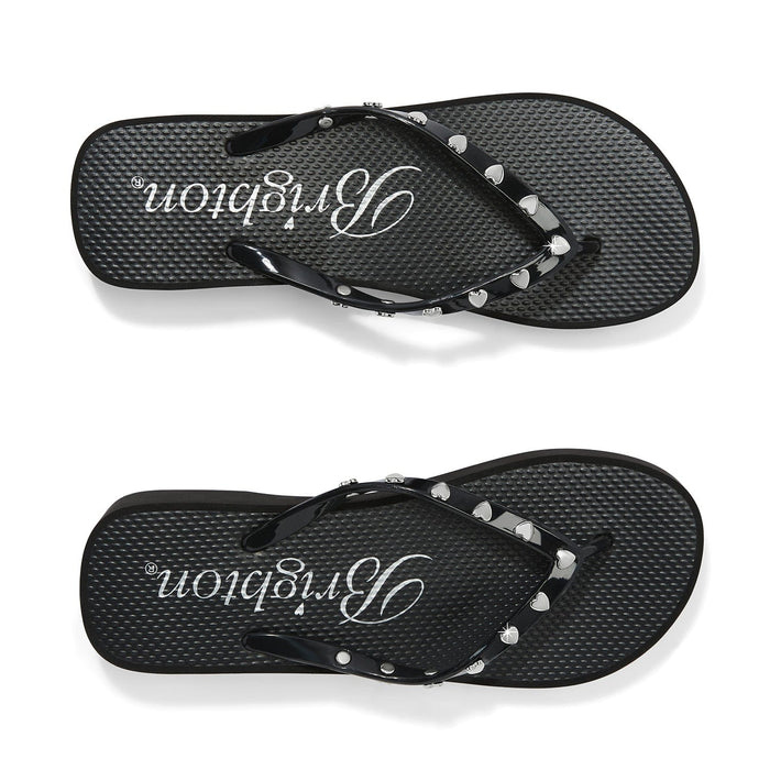 Brighton black rubber flip-flop sandals with silver-tone heart studs along the straps on a white background