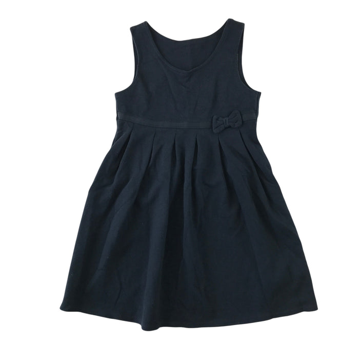 Front and back views of a second-hand girls navy blue jersey pinafore school dress