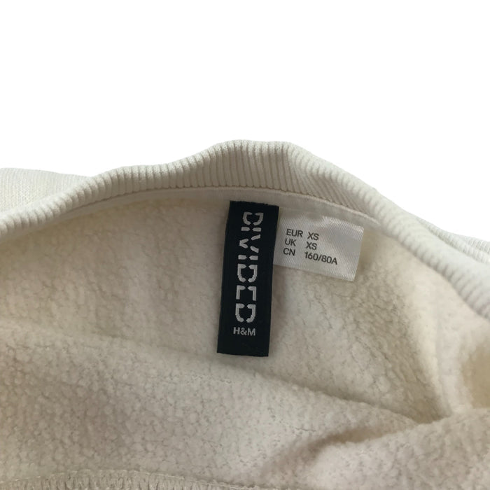 H&M women's XS cream embroidered human being sweater