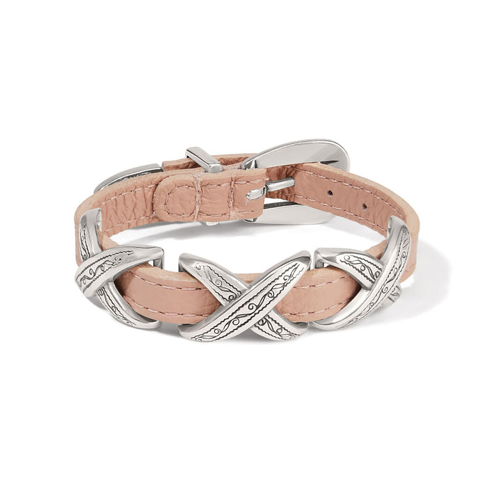 Brighton leather bracelet in pink with silver-plated engraved X-shaped accents and buckle closure on a white background