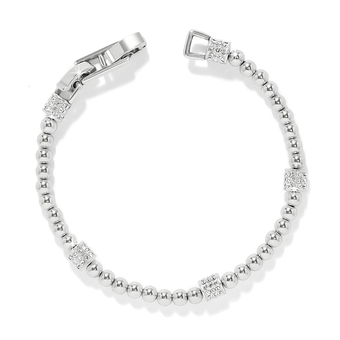 Brighton beaded bracelet with silver-tone beads, crystal pavé stations, and hinged clasp on a white background