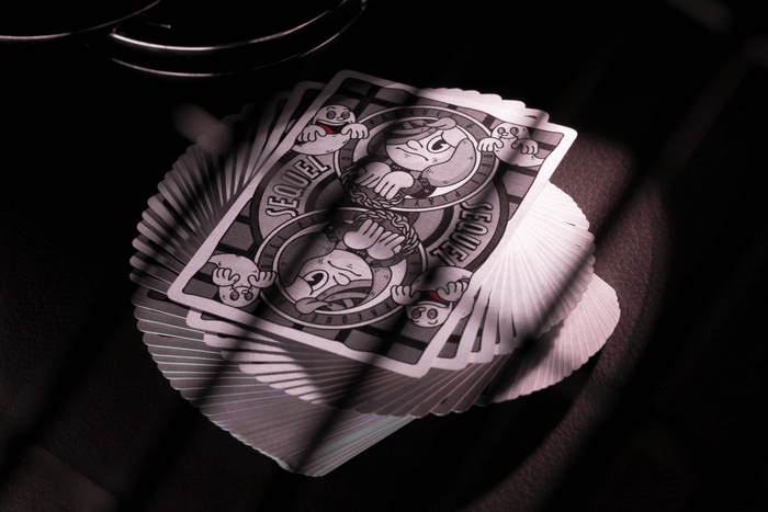 Sequel Playing cards with a unique design on a dark background