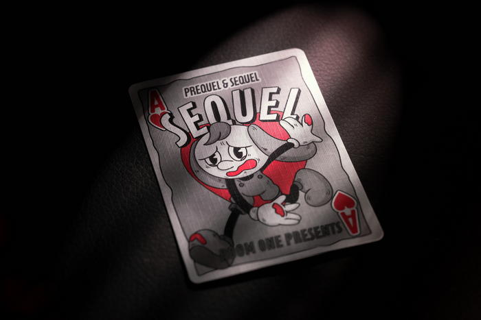 Sequel Edition Ace of Hearts with a cartoon character and text on a dark background