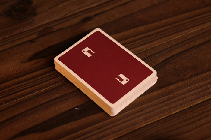 Burgundy Teak on a wooden surface