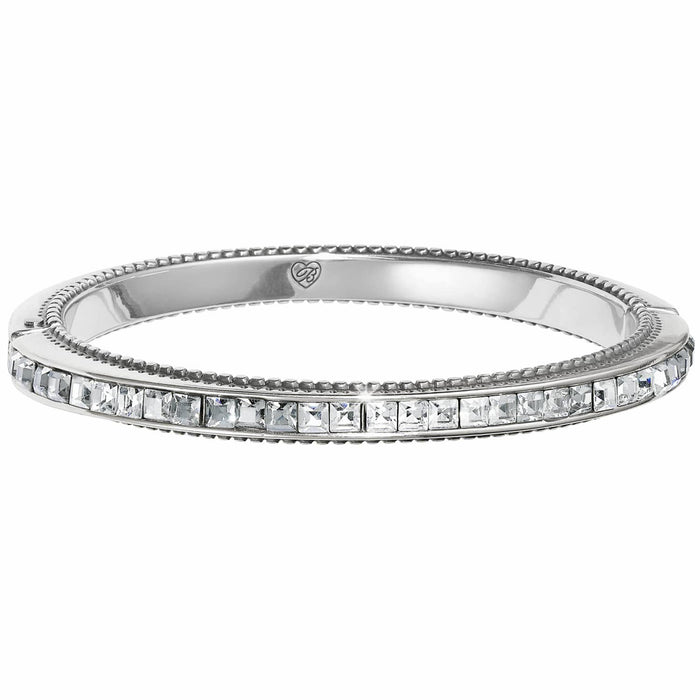 Brighton silver-plated bangle bracelet with channel-set square crystals and beaded edge detailing on a white background