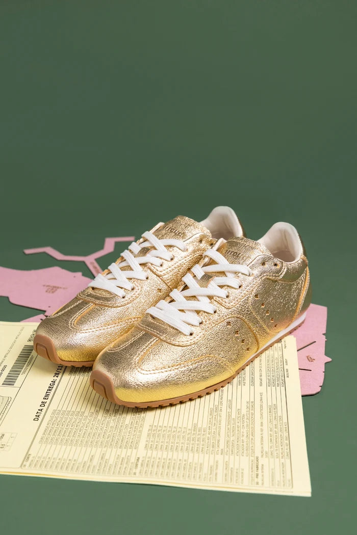Stella Sneaker In Gold Metallic Leather Sneaker Larroudé