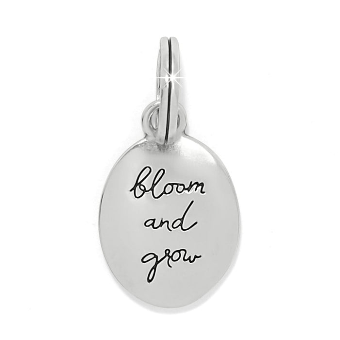 Brighton oval charm with silver-plated finish and engraved bloom and grow script lettering on a white background