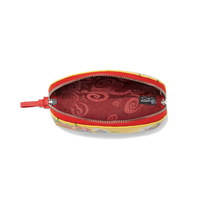 Brighton pouch shown open with red interior lining, yellow floral exterior, and red zipper on a white background