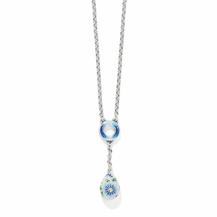 Brighton pendant necklace with silver-plated chain, blue enamel ring, and floral enamel teardrop charm on a white background