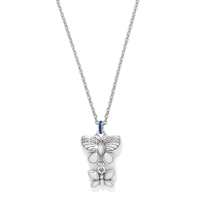 Brighton pendant necklace with two silver-plated butterfly charms, blue enamel bail, and crystal accents on a white background