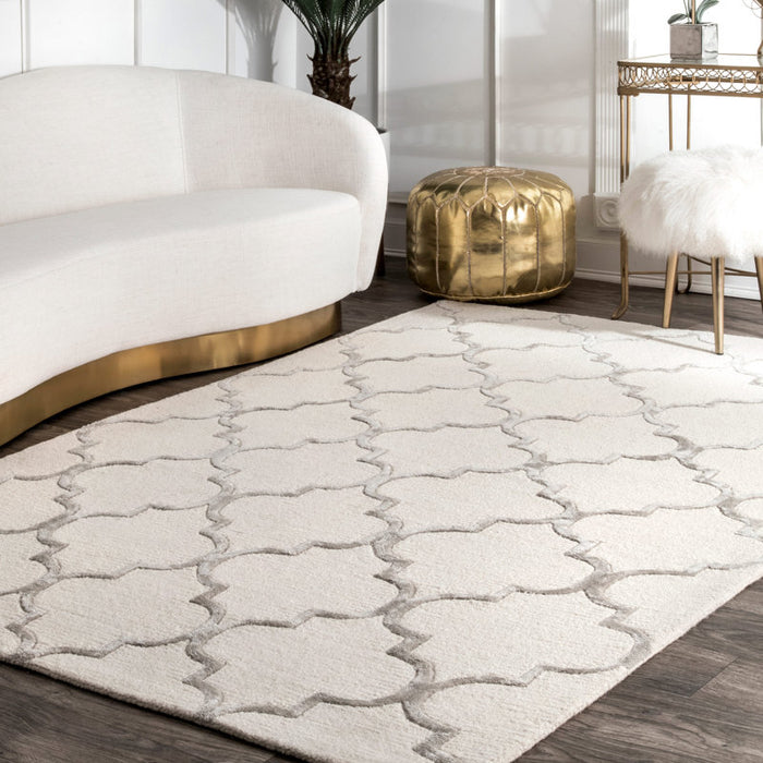 Tapis tufté main ivoire à motif géométrique Noirmont 152 x 244 cm