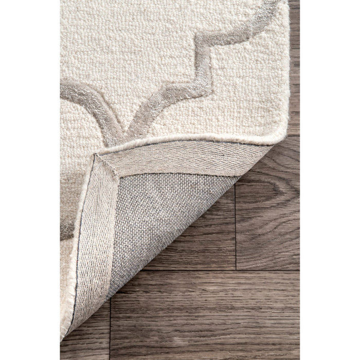 Tapis tufté main ivoire à motif géométrique Noirmont 152 x 244 cm