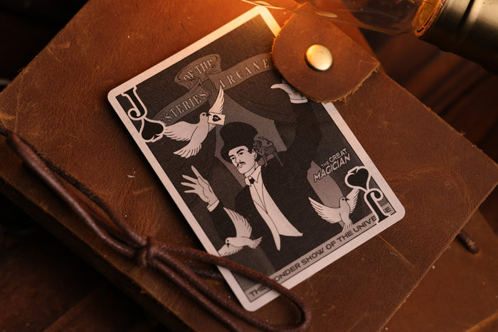 Court card featuring a vintage-style magician poster illustration on a brown leather surface