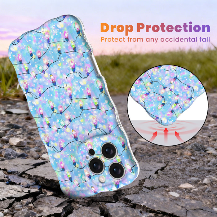 Twinkle All The Way Wavy Luxe MagSafe iPhone case with pastel Christmas string lights on sky blue, with shock-absorbing corners for drop protection