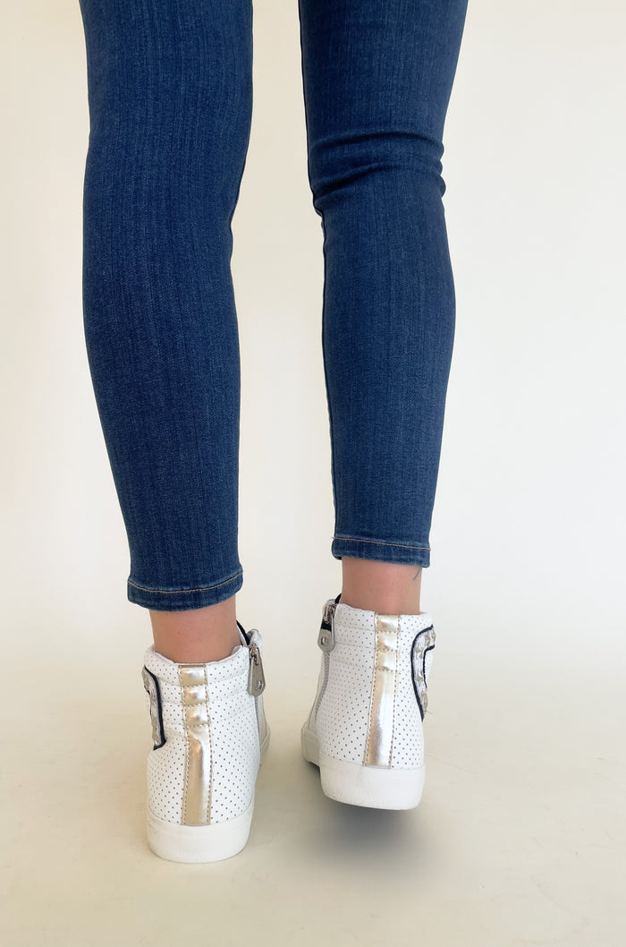 The Vintage Havana Gadol High Top Sneaker is just "WOW"!! It has so many incredible details that make this sneaker stand out. This style has a classic high top shape, star studs along the sides, and a black suede contrast on the front. It is an all out cool-girl shoe.